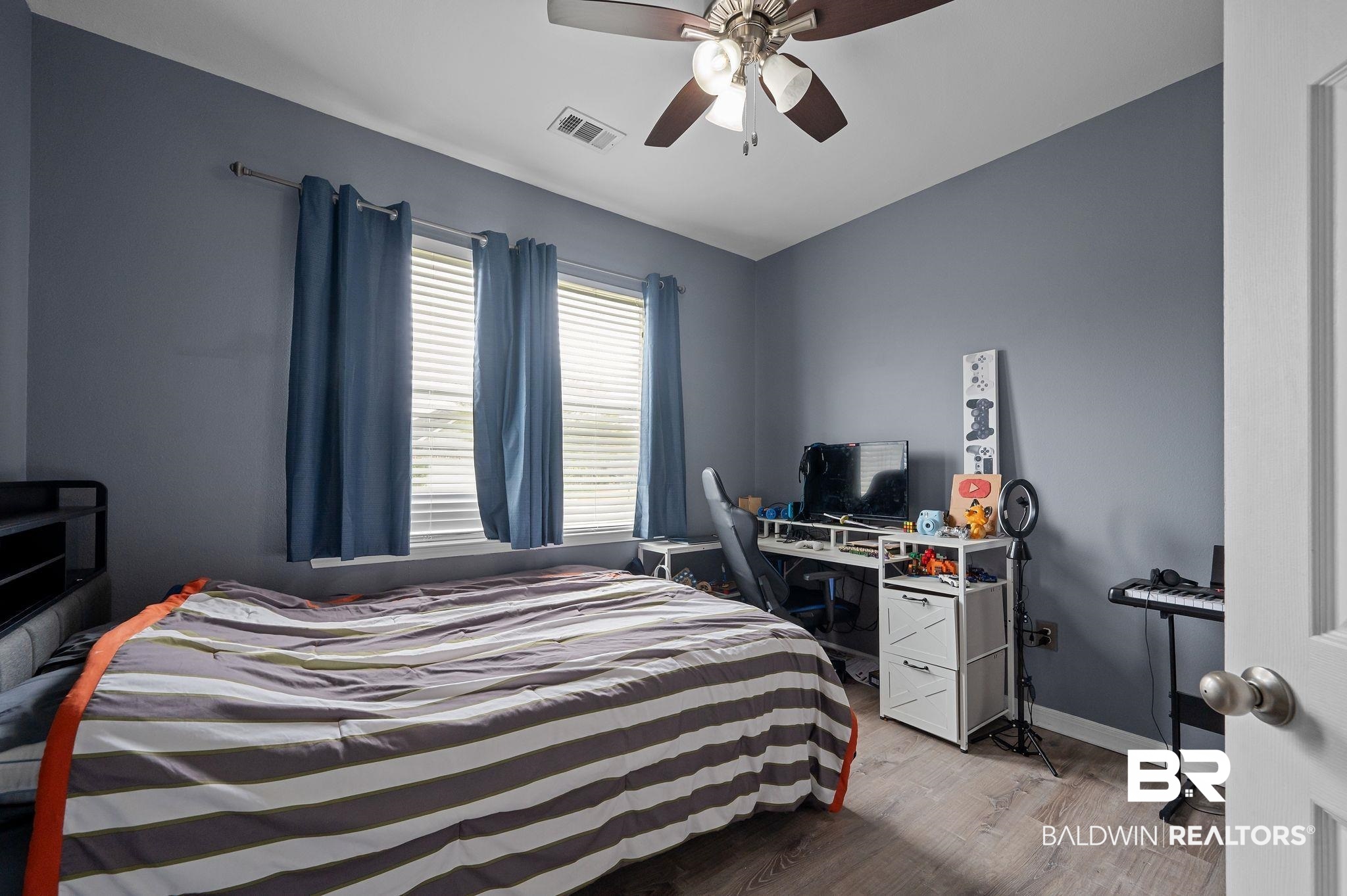 1287 Pembroke Way Foley, AL 36535 - Photo 30 of 39 Bedroom featuring wood finished floors and a ceiling fan