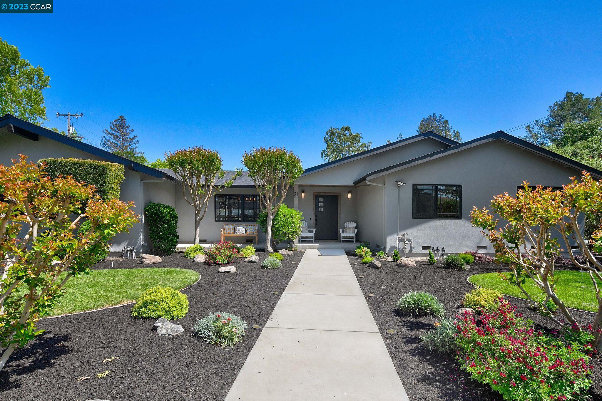 21 Dickenson Drive Moraga, CA 94556 - Photo 1 of 1 a front view of a house with a yard