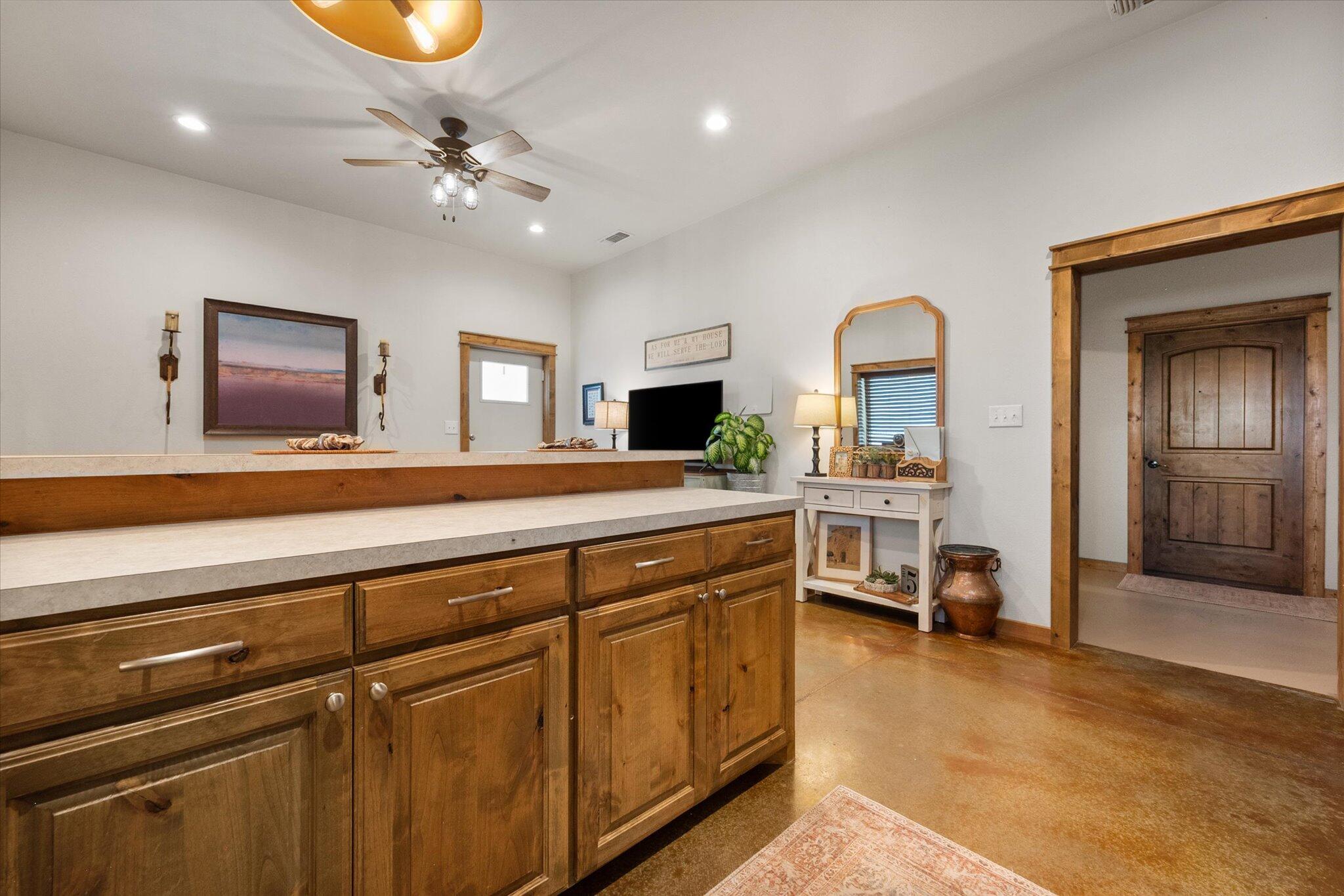 753 Co Road Plainview, TX 79072 - Photo 12 of 39 a spacious bathroom with a double vanity sink and a mirror