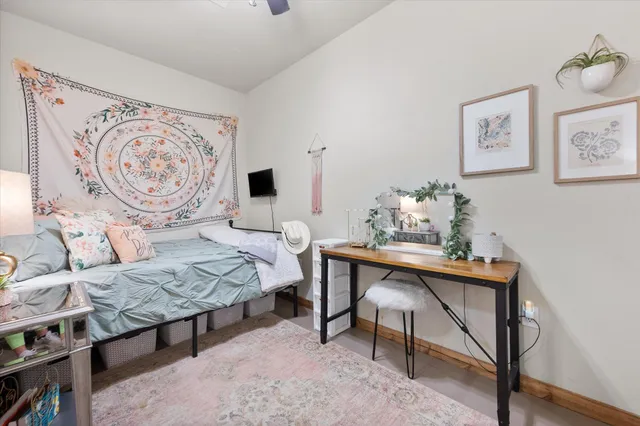 a spacious bathroom with a sink a mirror and a shower