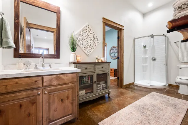 a bathroom with a sink and mirror