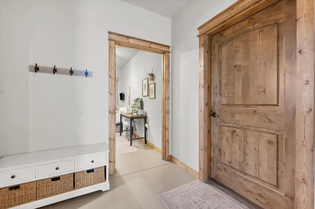 a view of parking garage with cars