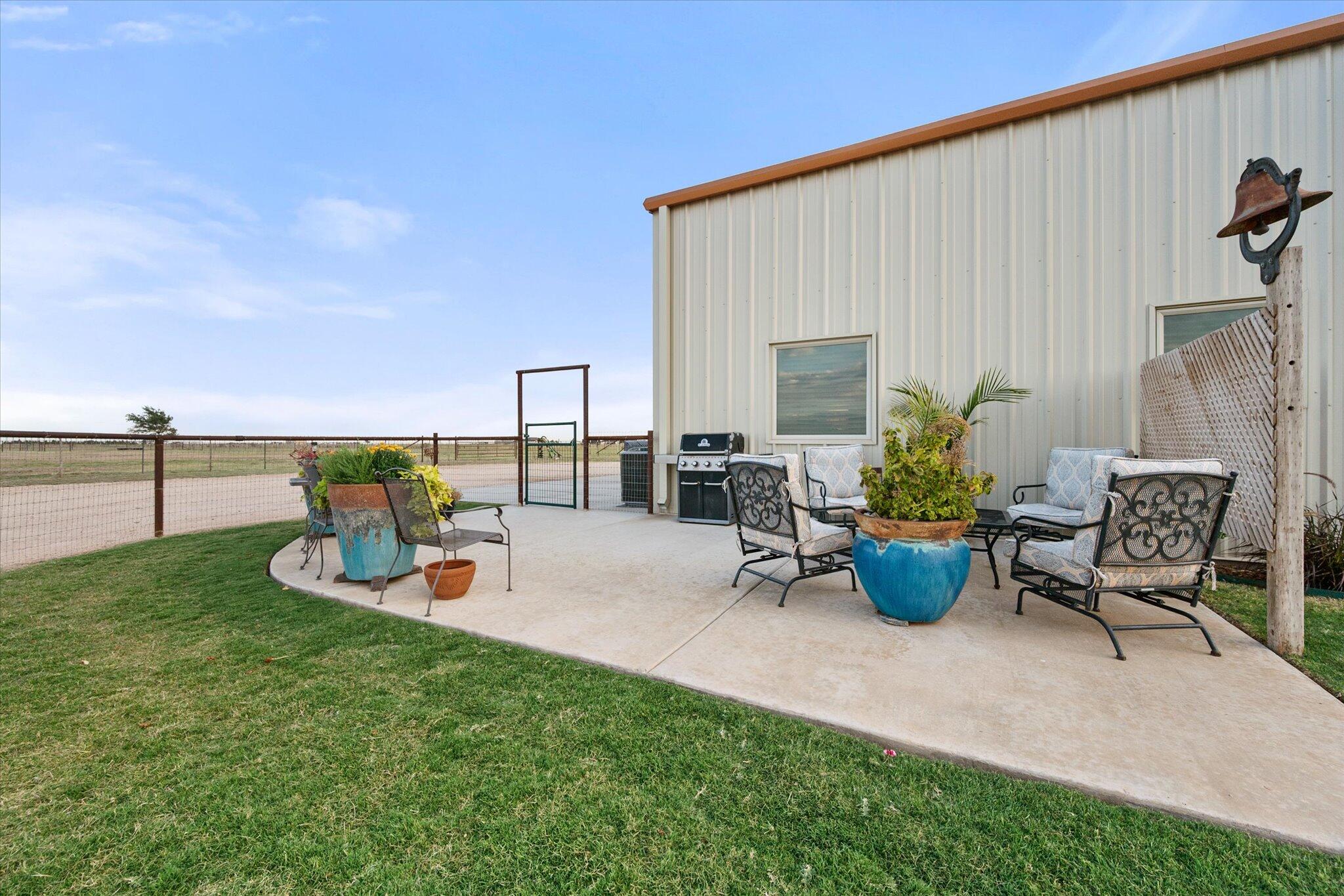 753 Co Road Plainview, TX 79072 - Photo 26 of 39 a view of a backyard with sitting area and furniture