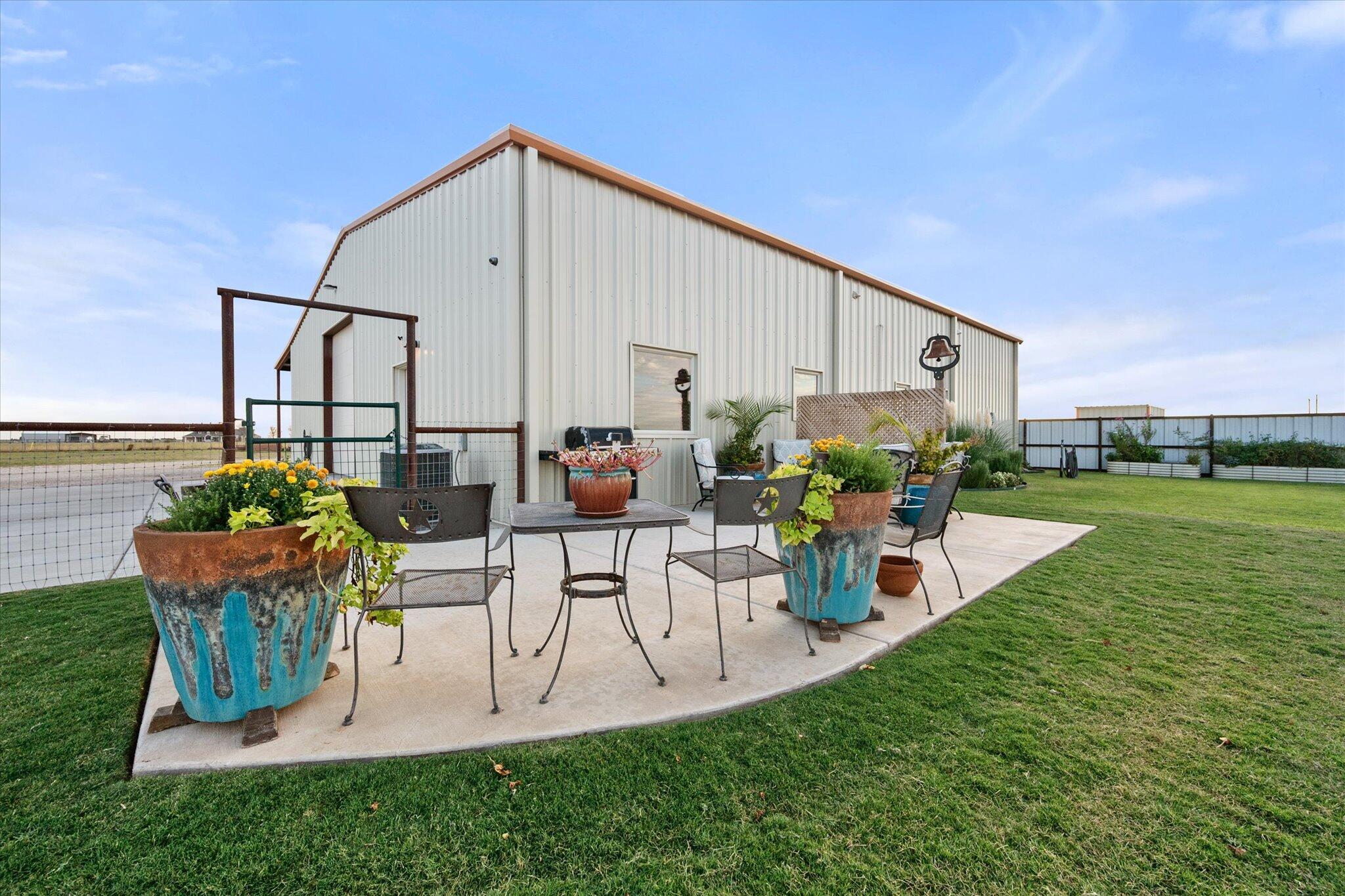 753 Co Road Plainview, TX 79072 - Photo 29 of 39 a view of a chairs and table in patio