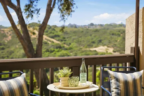 a view of a balcony with mountain view