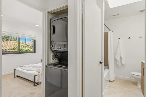 a en suite bathroom with a sink toilet and shower
