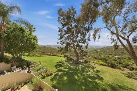 a view of lake with green space