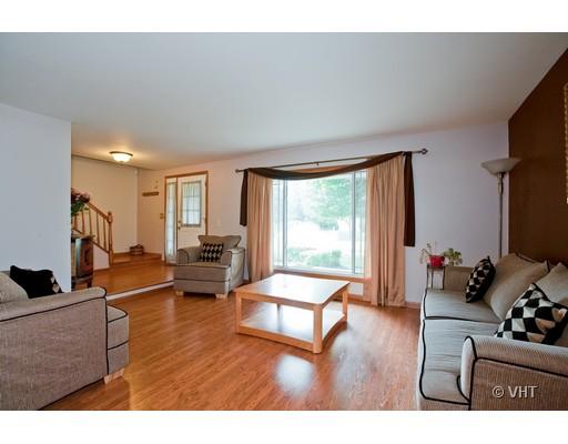 1118 Country Ridge Lane Bolingbrook, IL 60440 - Photo 2 of 16 a living room with furniture and a large window