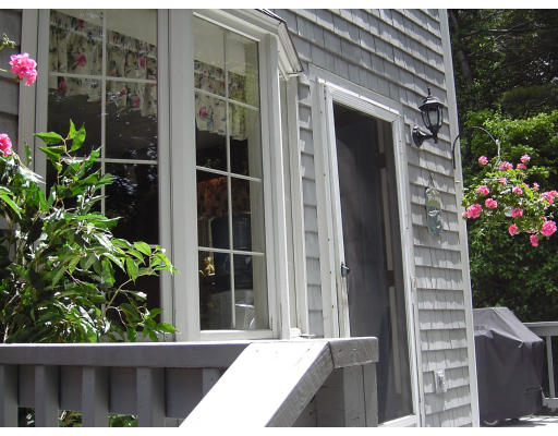 42 Marion Road Scituate, MA 02066 - Photo 4 of 4 a view of a door and chair in the balcony