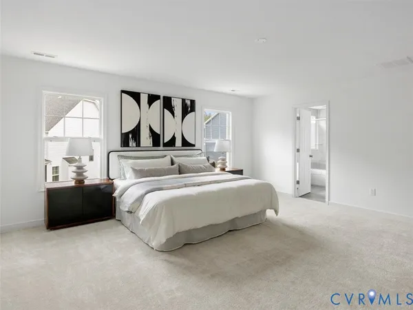 a bed room with a bed and a night stand