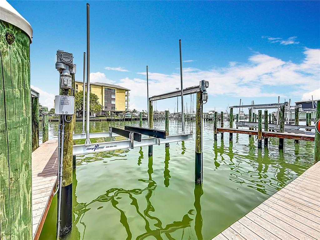 399 150th Avenue, Unit 317 Madeira Beach, FL 33708 - Photo 68 of 96 a lake view with a lake view