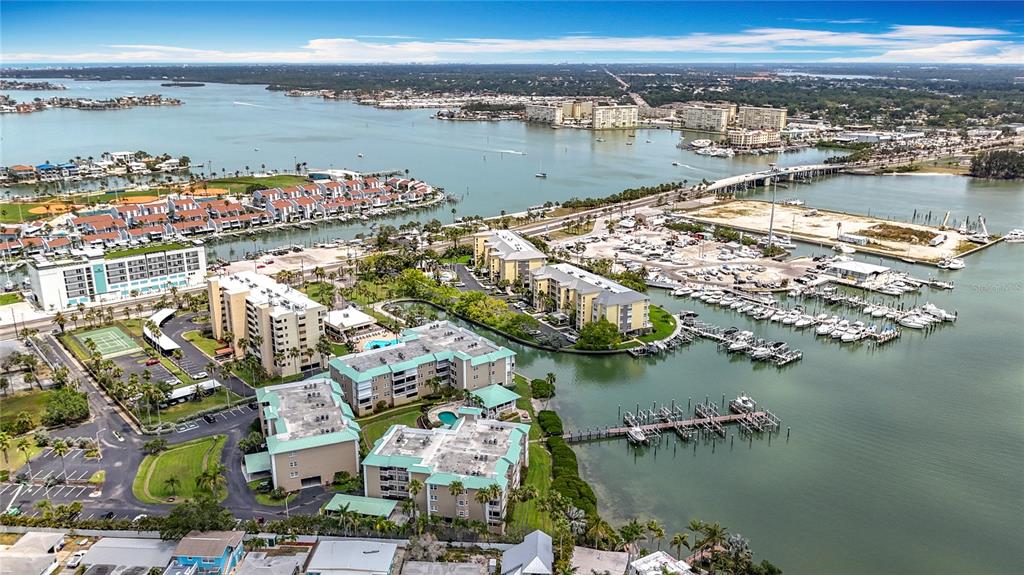 399 150th Avenue, Unit 317 Madeira Beach, FL 33708 - Photo 74 of 96 a view of a water and a mountain view