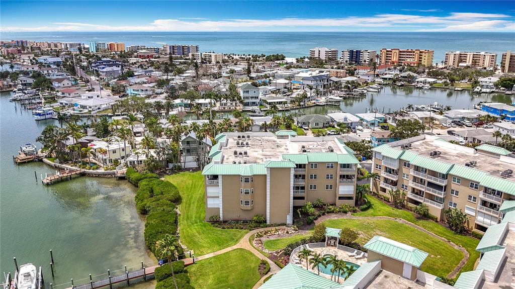399 150th Avenue, Unit 317 Madeira Beach, FL 33708 - Photo 80 of 96 a view of residential houses with outdoor space