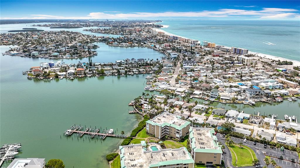 399 150th Avenue, Unit 317 Madeira Beach, FL 33708 - Photo 90 of 96 an aerial view of a city