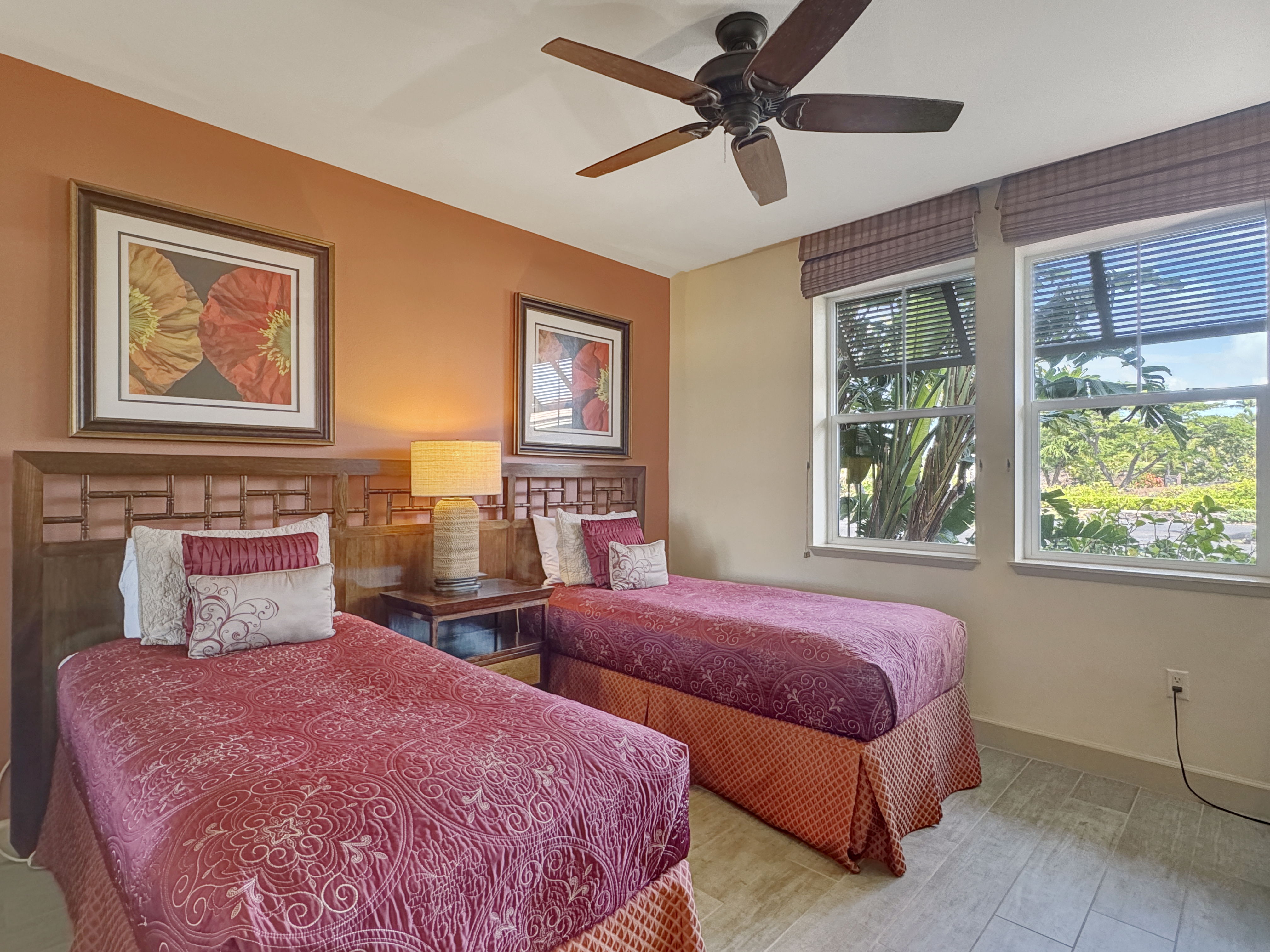 69-1033 Nawahine Place, Unit 9B Waikoloa, HI 96738 - Photo 12 of 24 a bedroom with three beds and a window