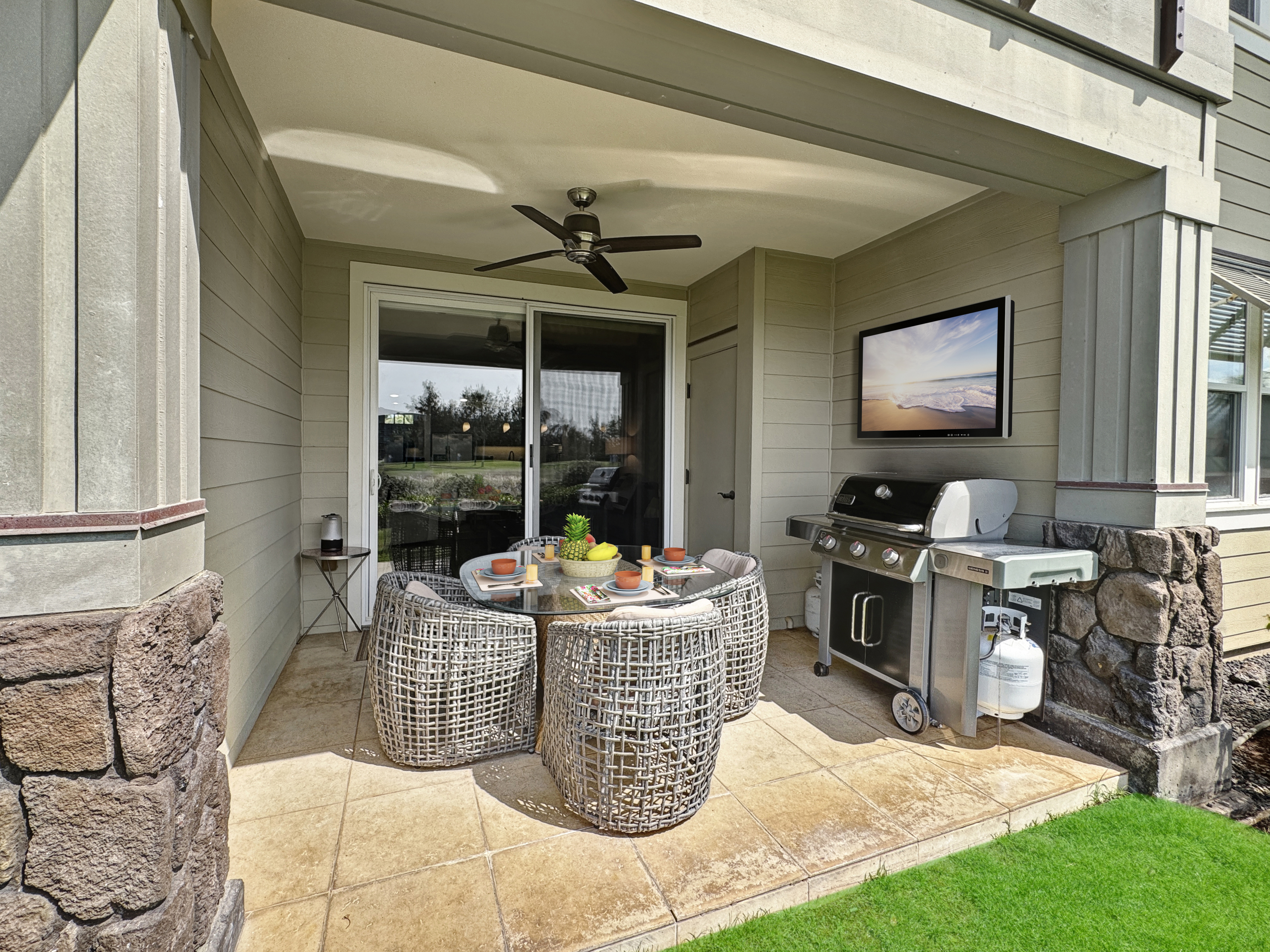 69-1033 Nawahine Place, Unit 9B Waikoloa, HI 96738 - Photo 16 of 24 a living room with furniture a window and a fireplace