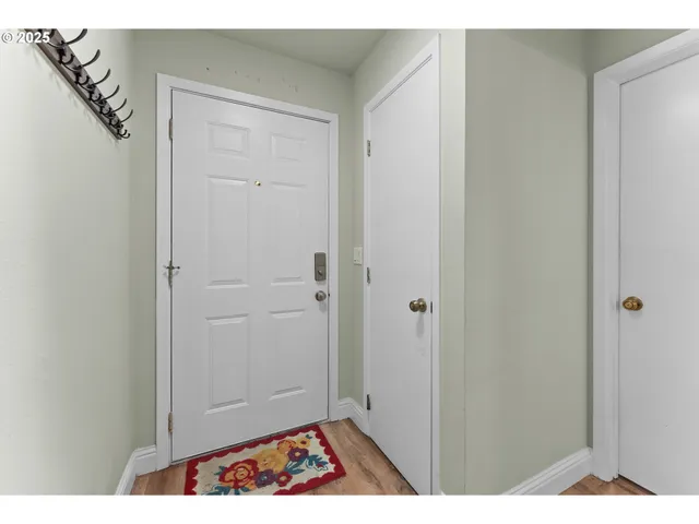 a view of room with window and hardwood
