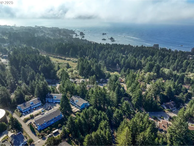 a view of a back yard from a balcony