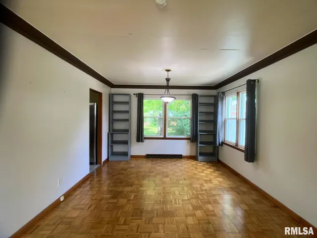 a view of livingroom with window and hardwood floor