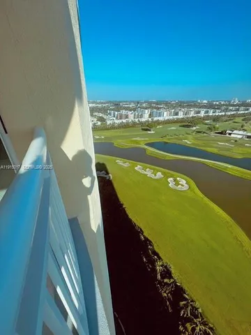 a view of a balcony with an ocean
