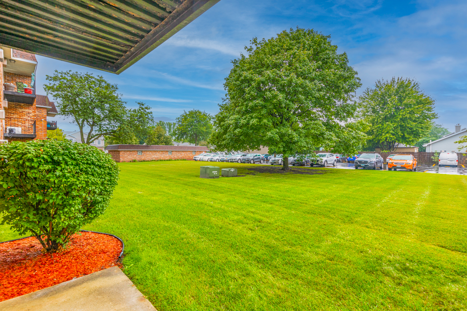 850 South Lorraine Road, Unit 1J Wheaton, IL 60189 - Photo 20 of 22 a view of yard with swimming pool and green space