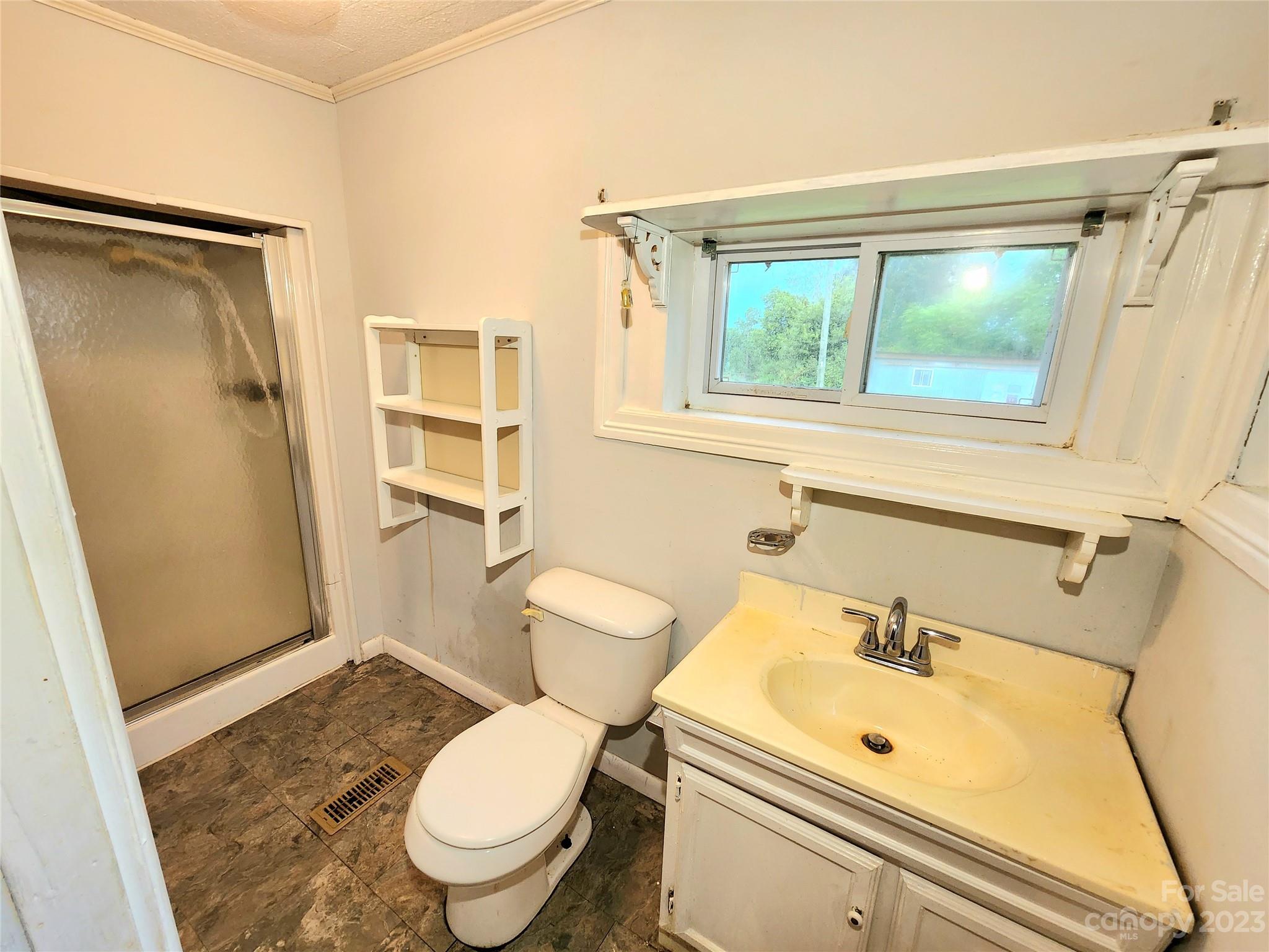 6806 Lackey Road Vale, NC 28168 - Photo 11 of 21 a bathroom with a sink toilet and shower