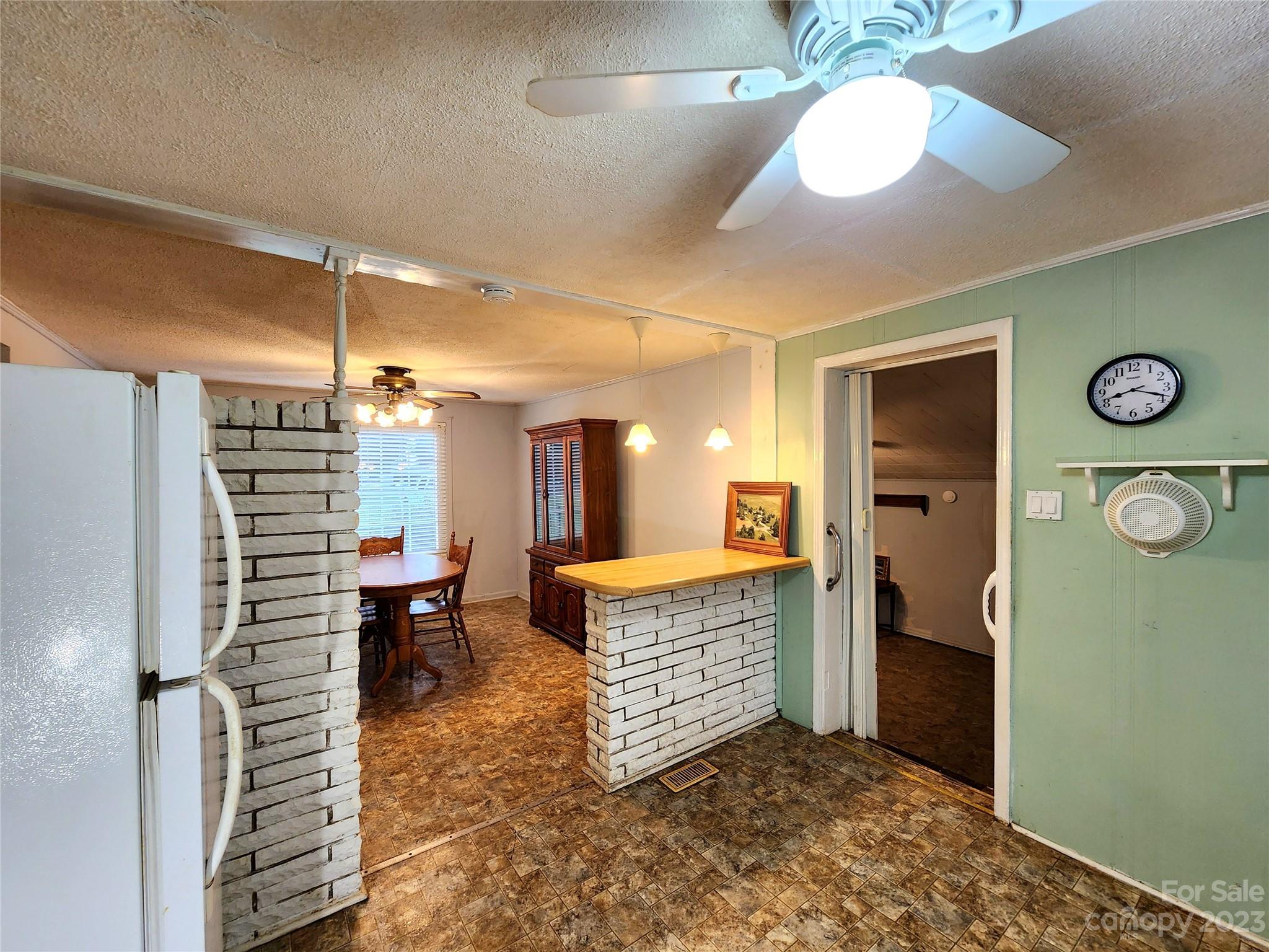 6806 Lackey Road Vale, NC 28168 - Photo 8 of 21 a room with lots of furniture and chandelier