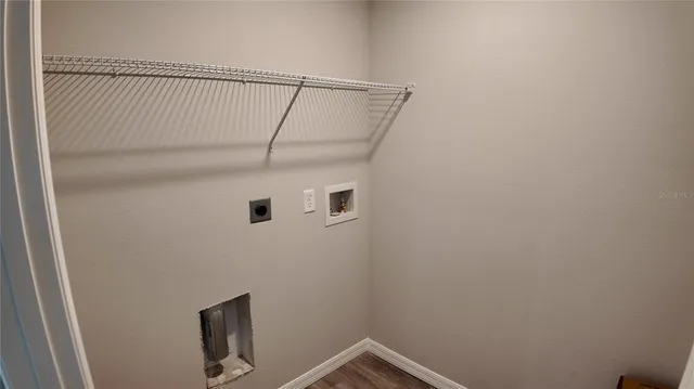 a view of entryway with rack on the wall