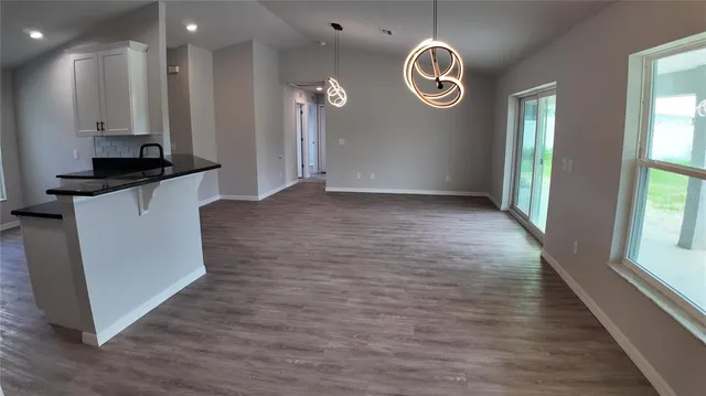a view of a hallway with entryway