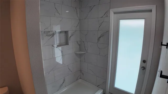a bathroom with a double vanity sink and mirror