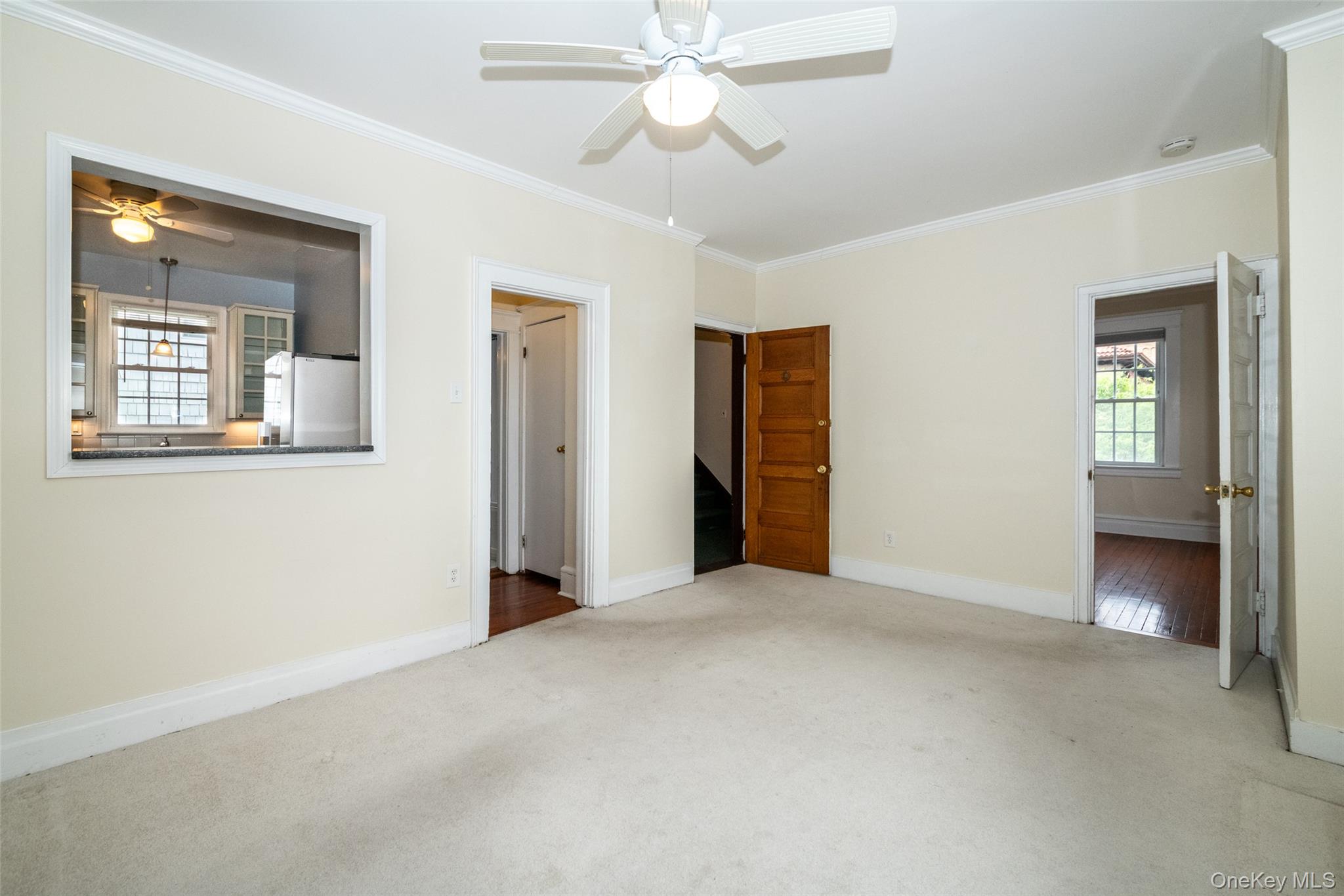 82 Clove Road New Rochelle, NY 10801 - Photo 13 of 39 an empty room with a bathroom and a mirror