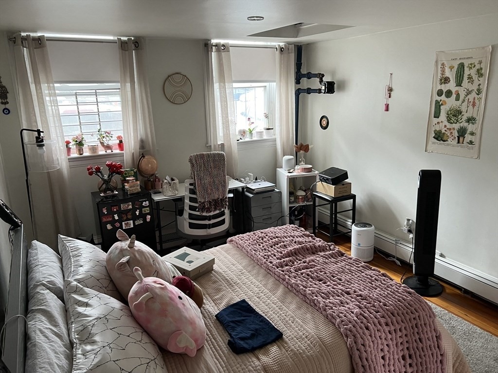 137 Peterborough Street, Unit 31 Boston, MA 02215 - Photo 8 of 14 a bedroom with a bed and a window