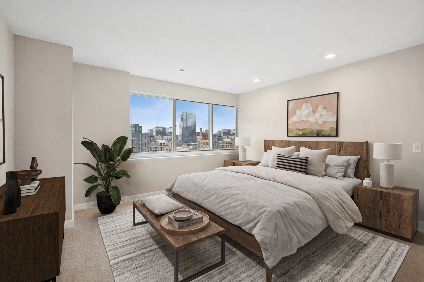 737 West Washington Boulevard, Unit 710 Chicago, IL 60661 - Photo 9 of 14 a bedroom with a large bed and a potted plant