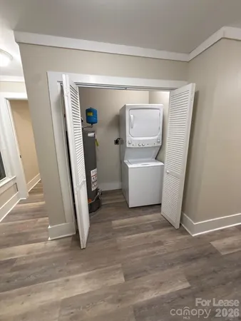 a view of a room with furniture and front door