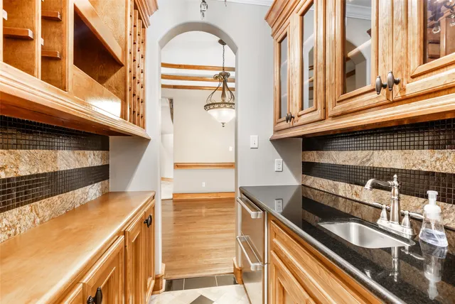 a view of a balcony with car parked