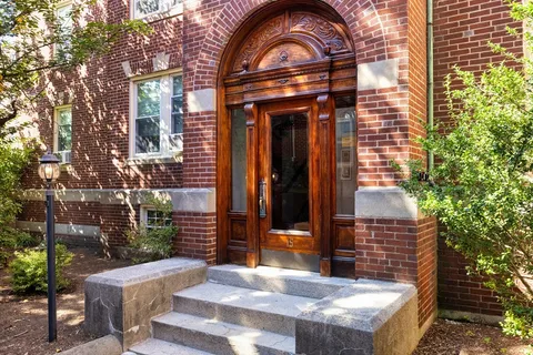 a view of entrance gate of a house