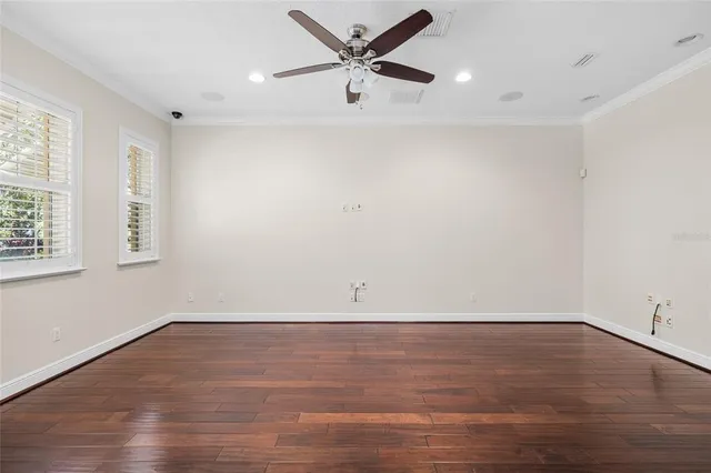 a view of a deck with a large trees