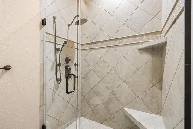 a view of a lake with a lot of trees in front of it