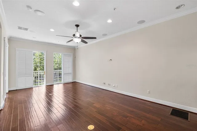 a large kitchen with stainless steel appliances granite countertop a stove a sink and a refrigerator