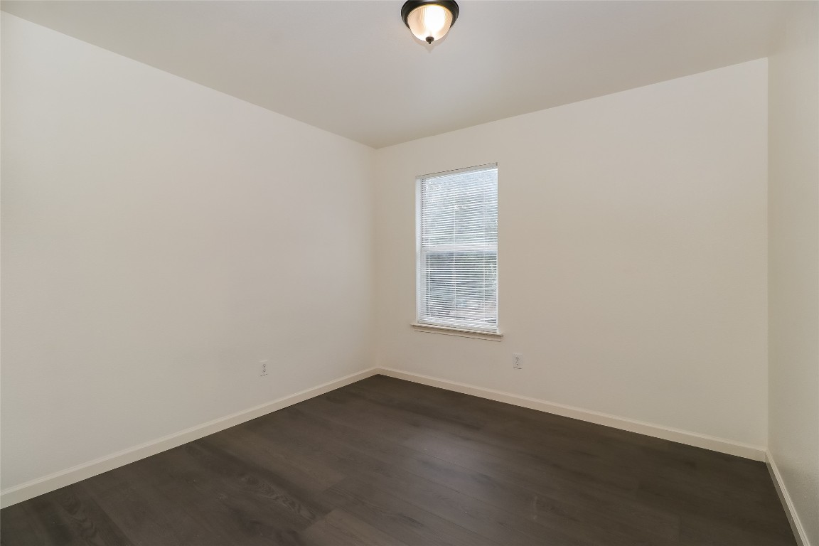 7012 Doyal Drive Austin, TX 78747 - Photo 13 of 17 an empty room with a window