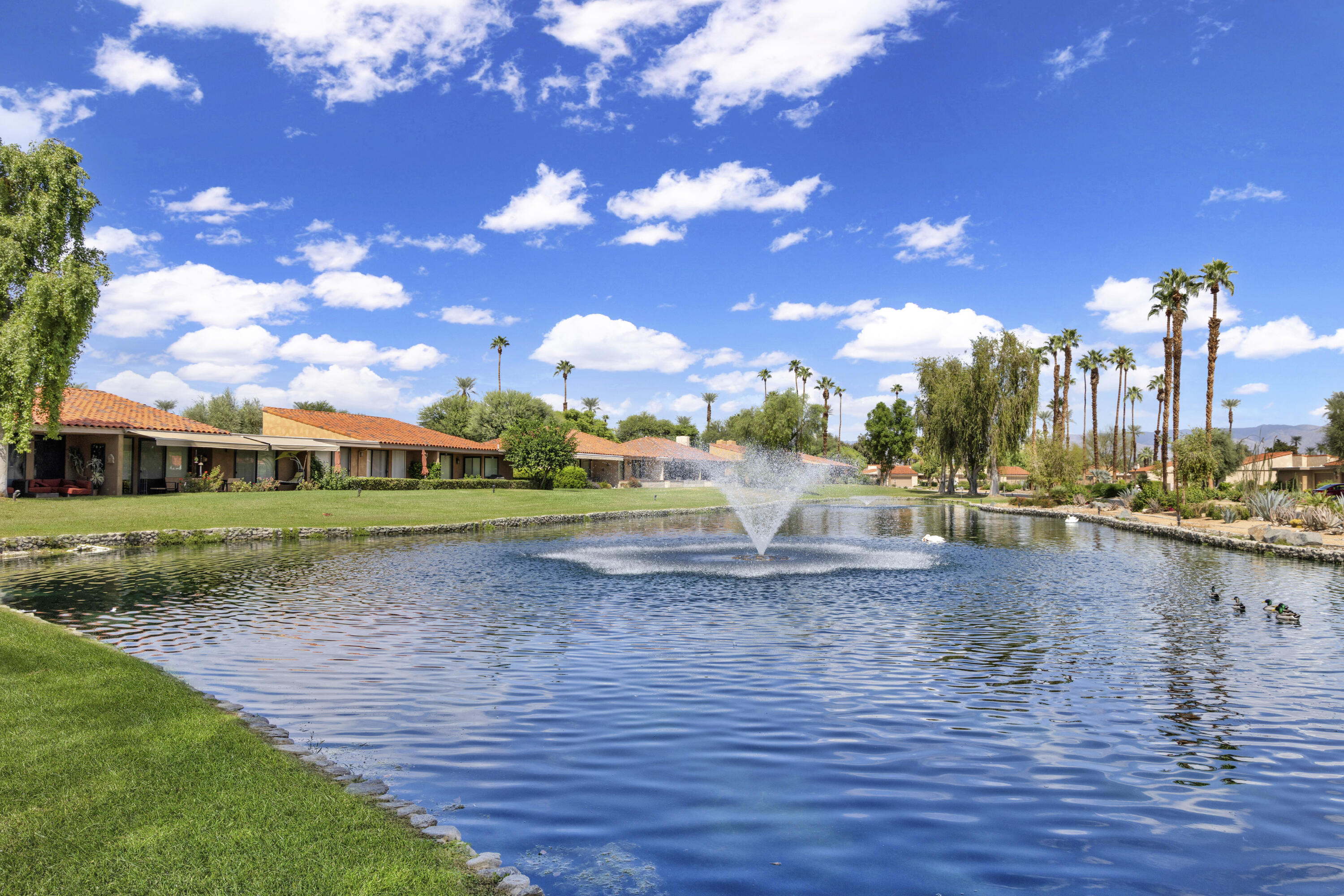 a view of a lake with houses