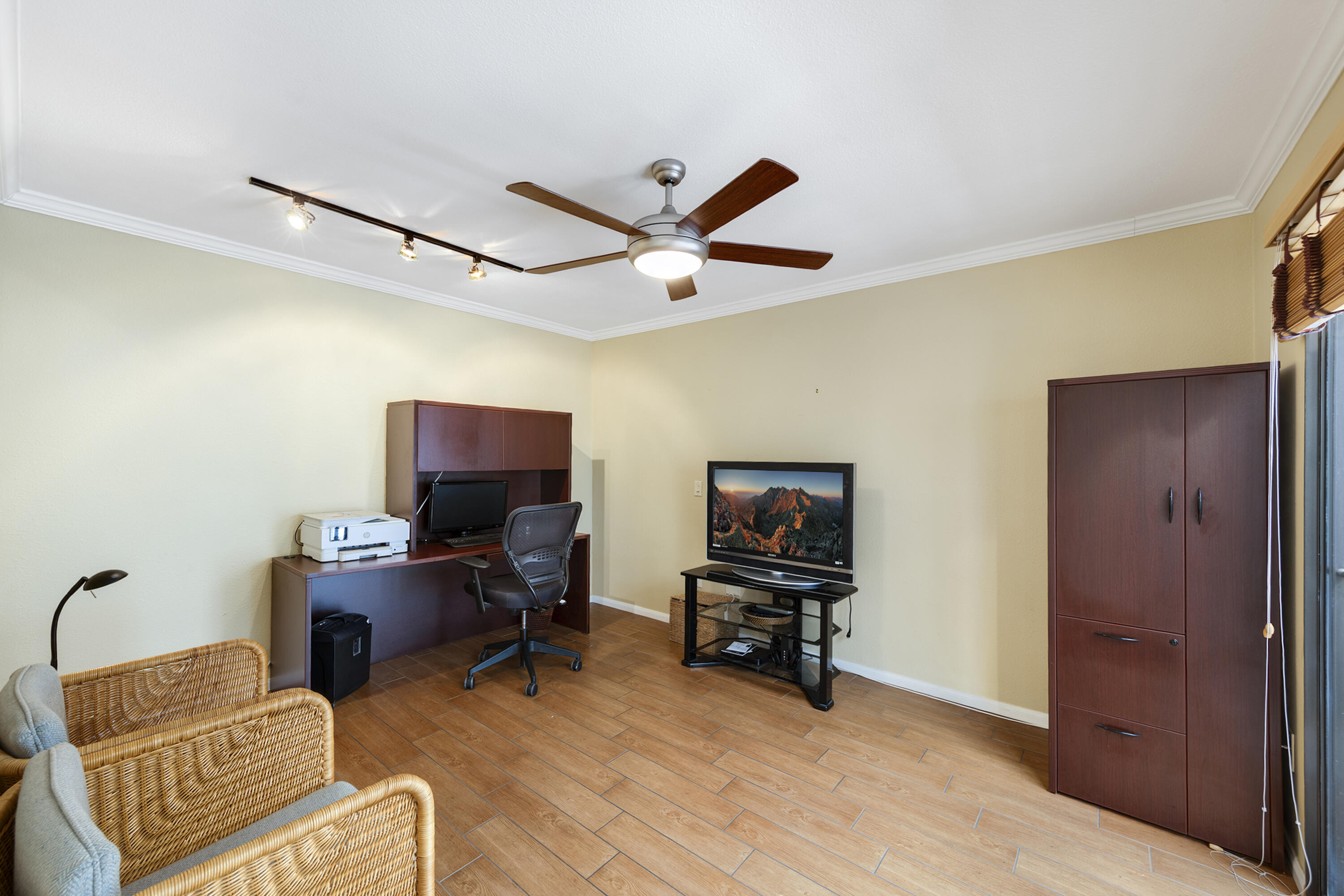 5 Valencia Drive Rancho Mirage, CA 92270 - Photo 24 of 45 a livingroom with workspace and a couch