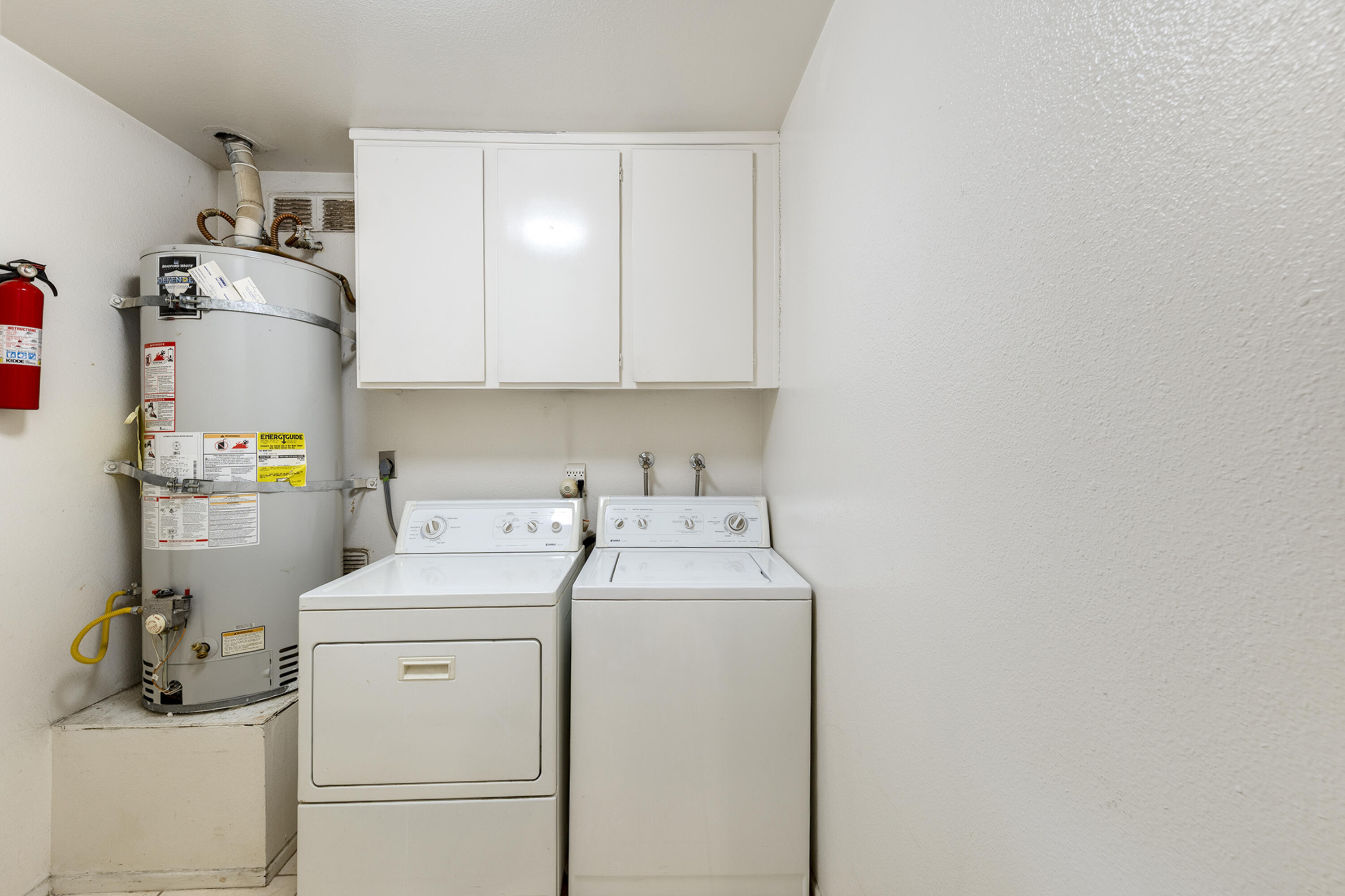 5 Valencia Drive Rancho Mirage, CA 92270 - Photo 25 of 45 a view of storage and utility room with washer and dryer