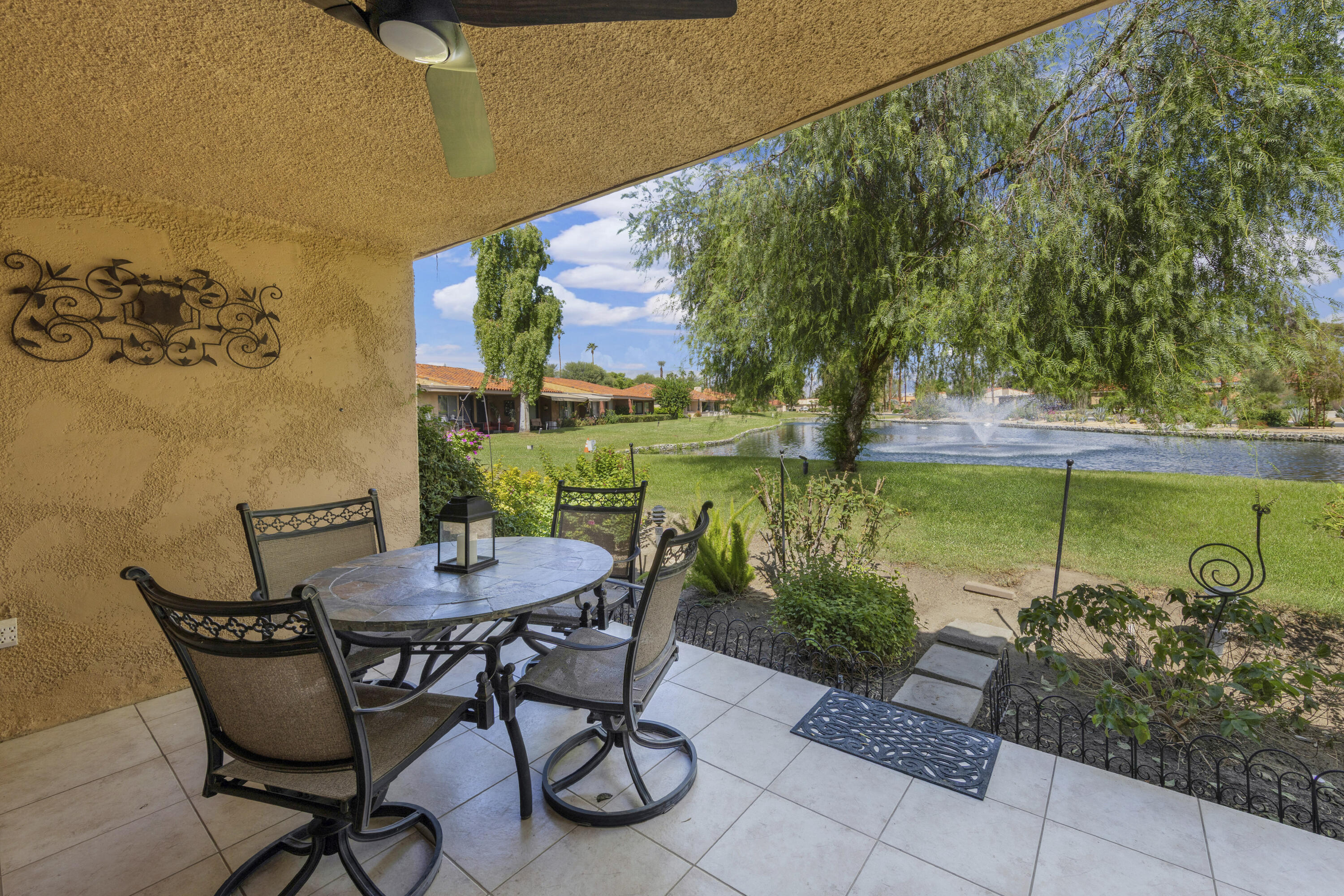 5 Valencia Drive Rancho Mirage, CA 92270 - Photo 29 of 45 a view of an outdoor sitting area with swimming pool