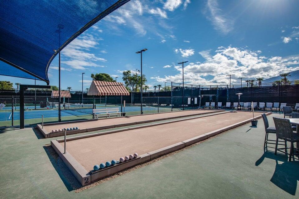5 Valencia Drive Rancho Mirage, CA 92270 - Photo 43 of 45 a view of a swimming pool with a patio and a yard