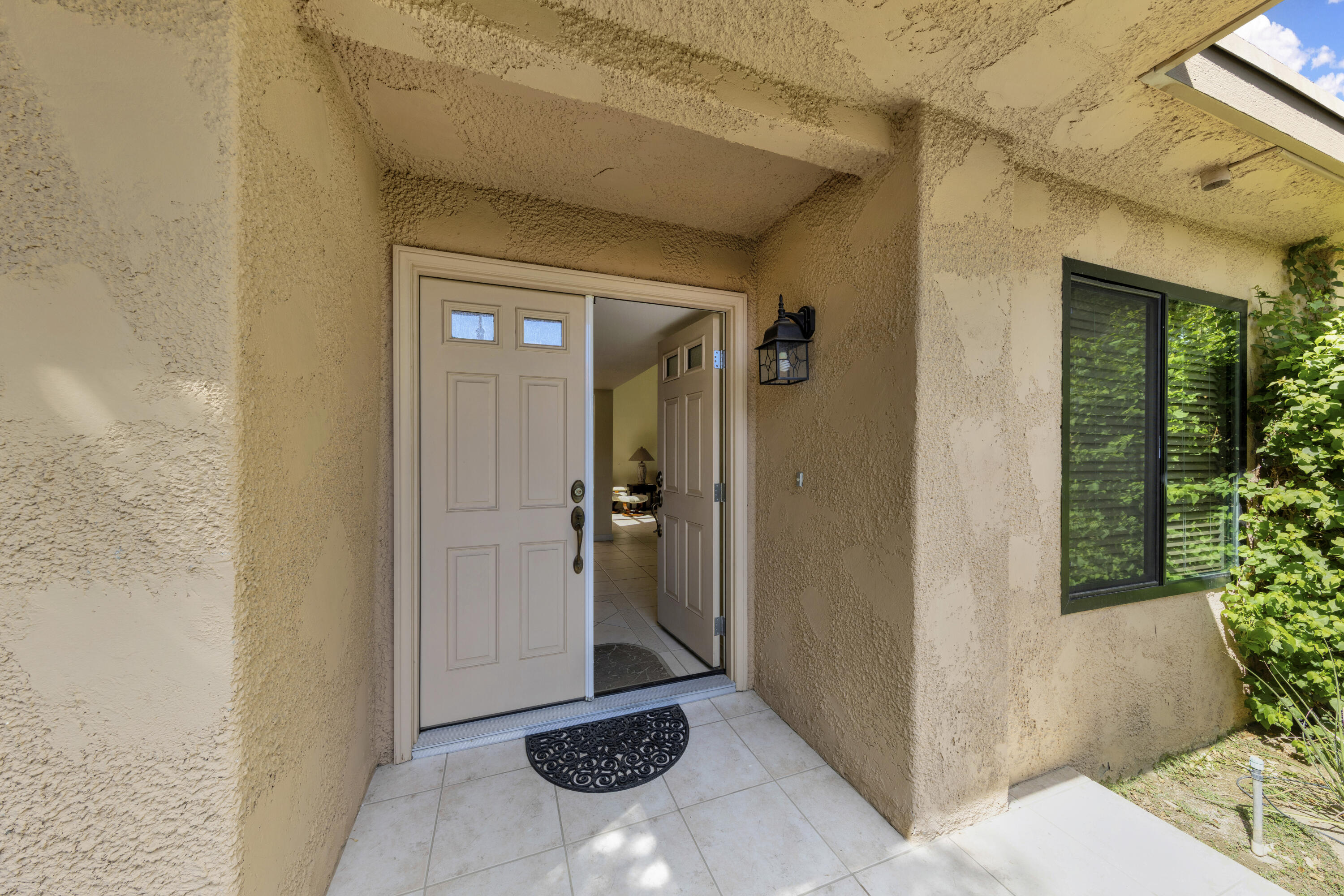 5 Valencia Drive Rancho Mirage, CA 92270 - Photo 5 of 45 a view of a bathroom with a sink