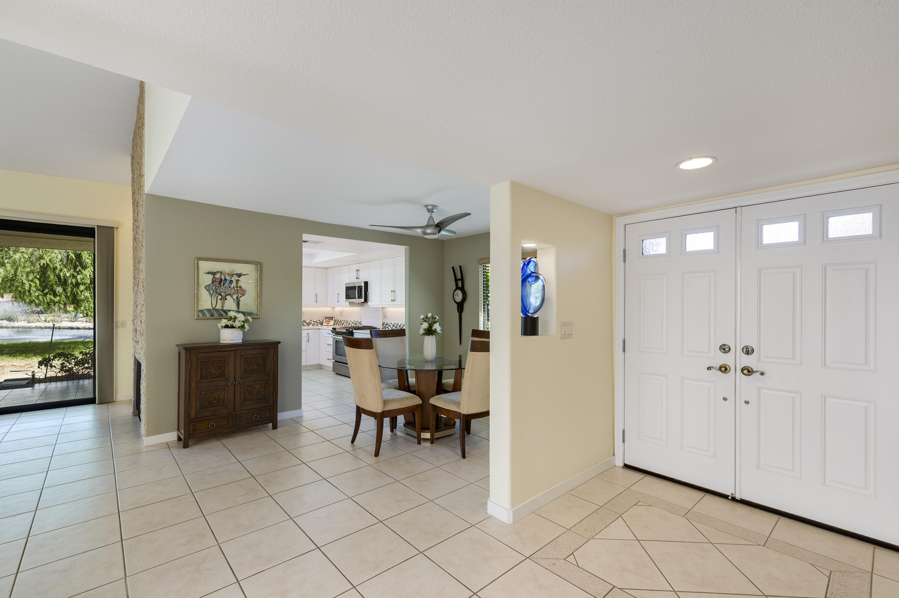 5 Valencia Drive Rancho Mirage, CA 92270 - Photo 8 of 45 a view of a livingroom with workspace and a couch