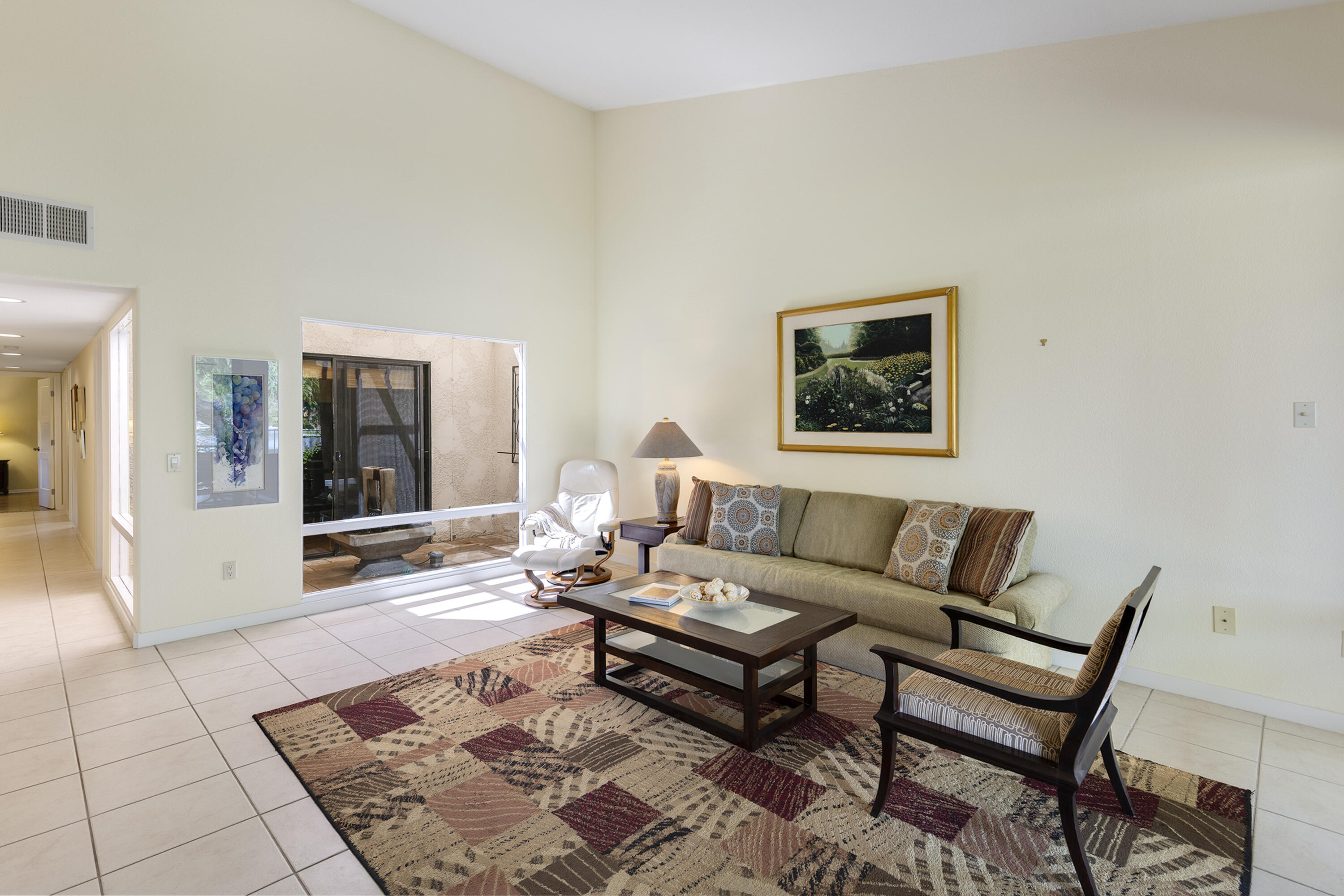 5 Valencia Drive Rancho Mirage, CA 92270 - Photo 9 of 45 a living room with furniture and wooden floor