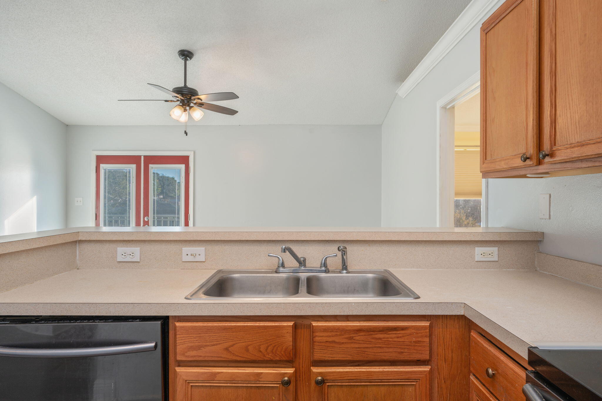 410 Winddrift Court Crestview, FL 32536 - Photo 13 of 44 a kitchen with a sink and a window