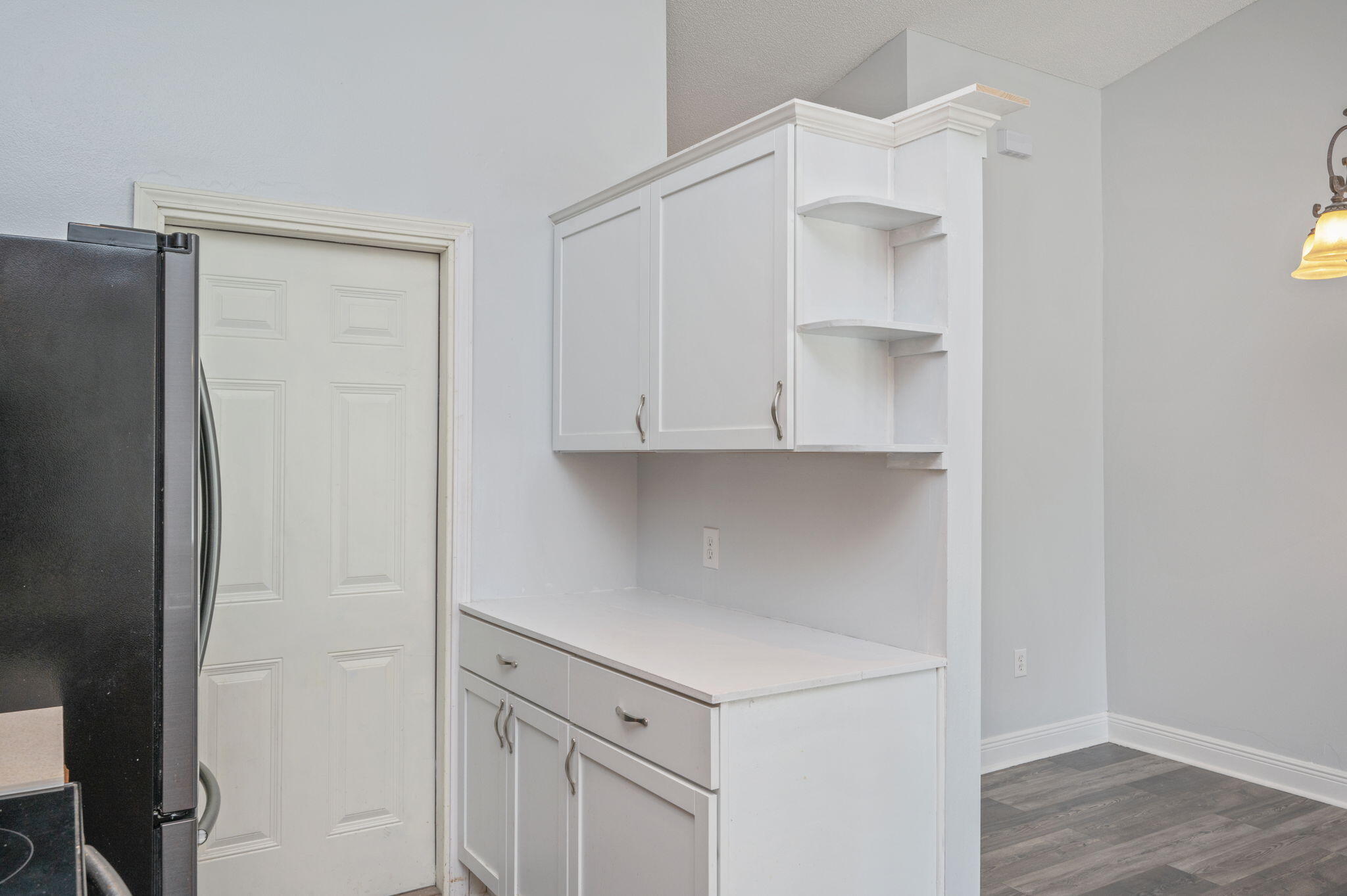 410 Winddrift Court Crestview, FL 32536 - Photo 16 of 44 a white refrigerator freezer sitting inside of a kitchen